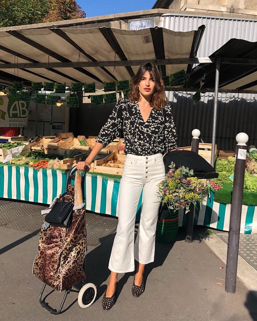 Jeanne Damas Spring Style with white crop flare jeans and Rouje top