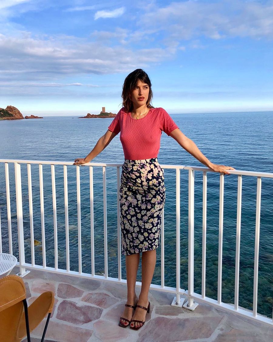 Jeanne Damas Summer outfit with floral midi skirt, By far sandals in South of France