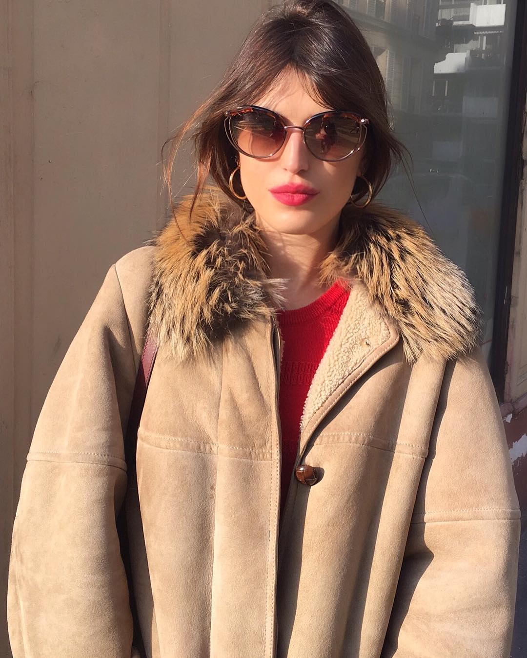 Jeanne Damas camel winter coat and 70s oversized sunglasses