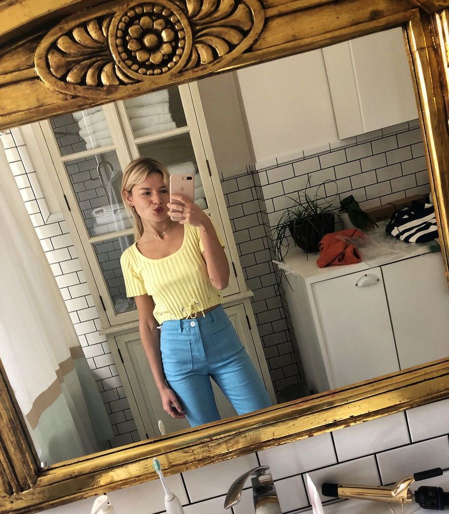 Yellow top and blue pants Staud Sabina Socol French Girl Spring style