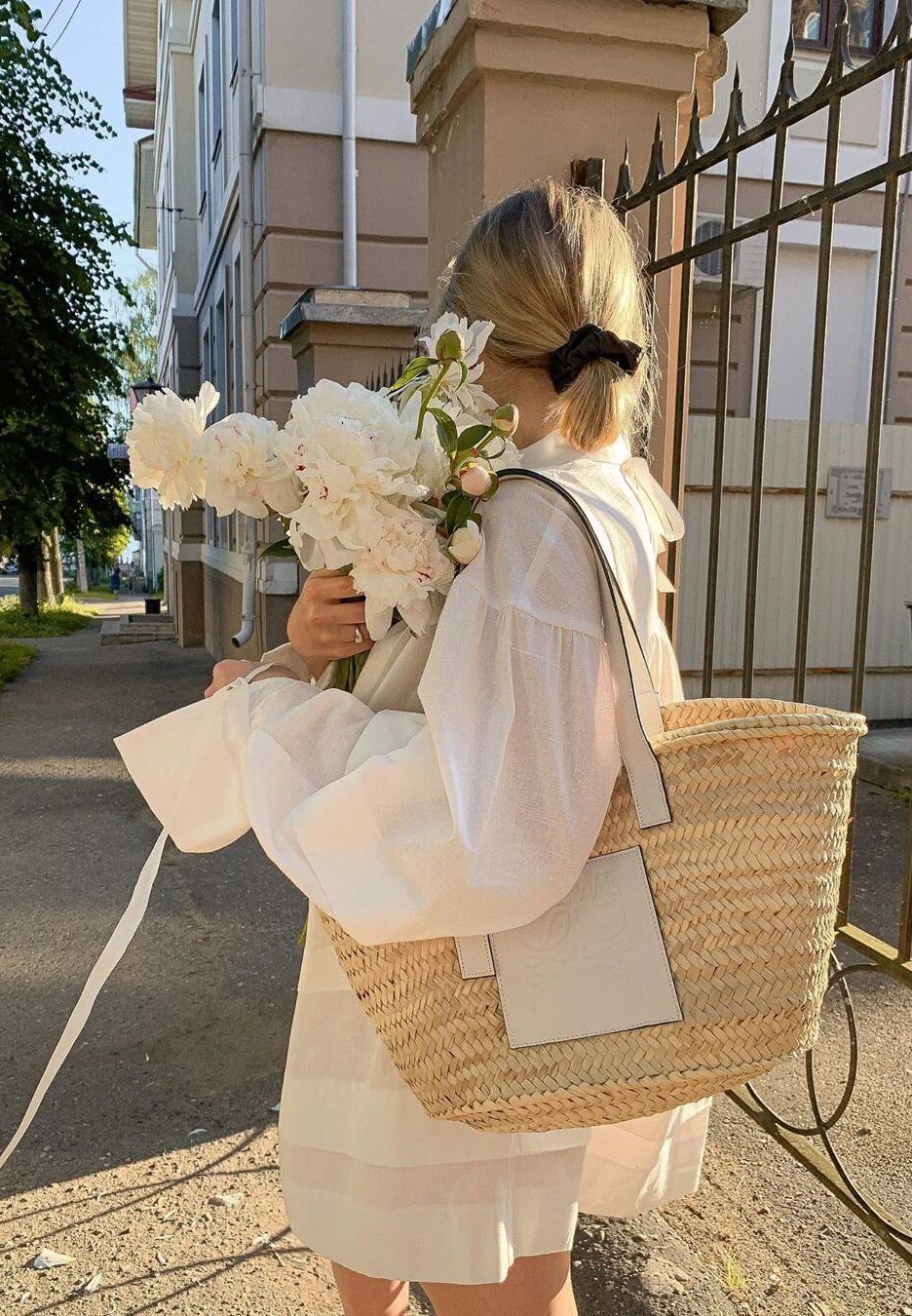 French White dress outfit with straw market tote bag 