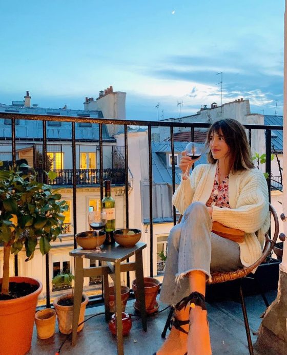 french vs american lifestyle wine on balcony jeannedamas